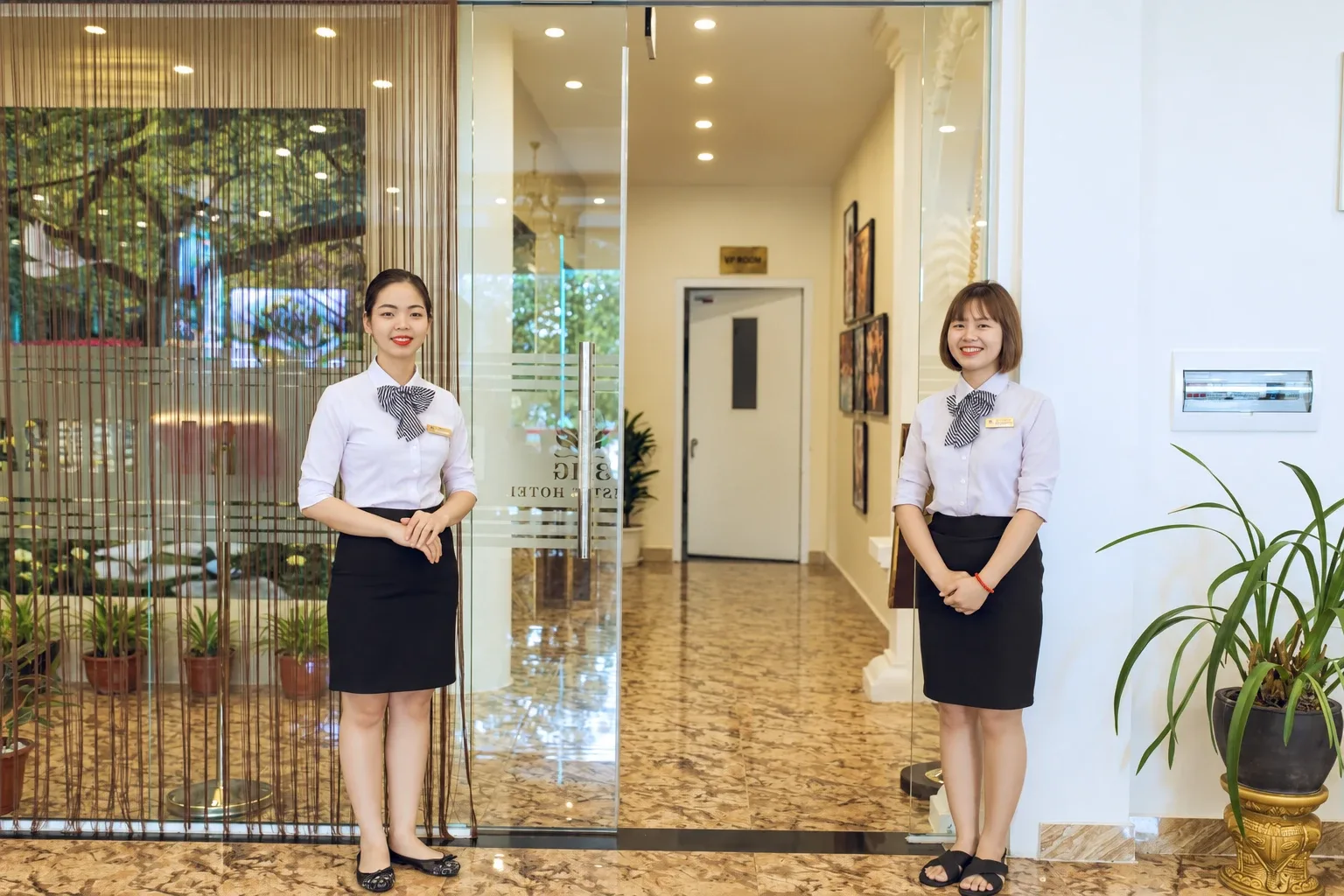 3MG staff welcoming guests at the entrance